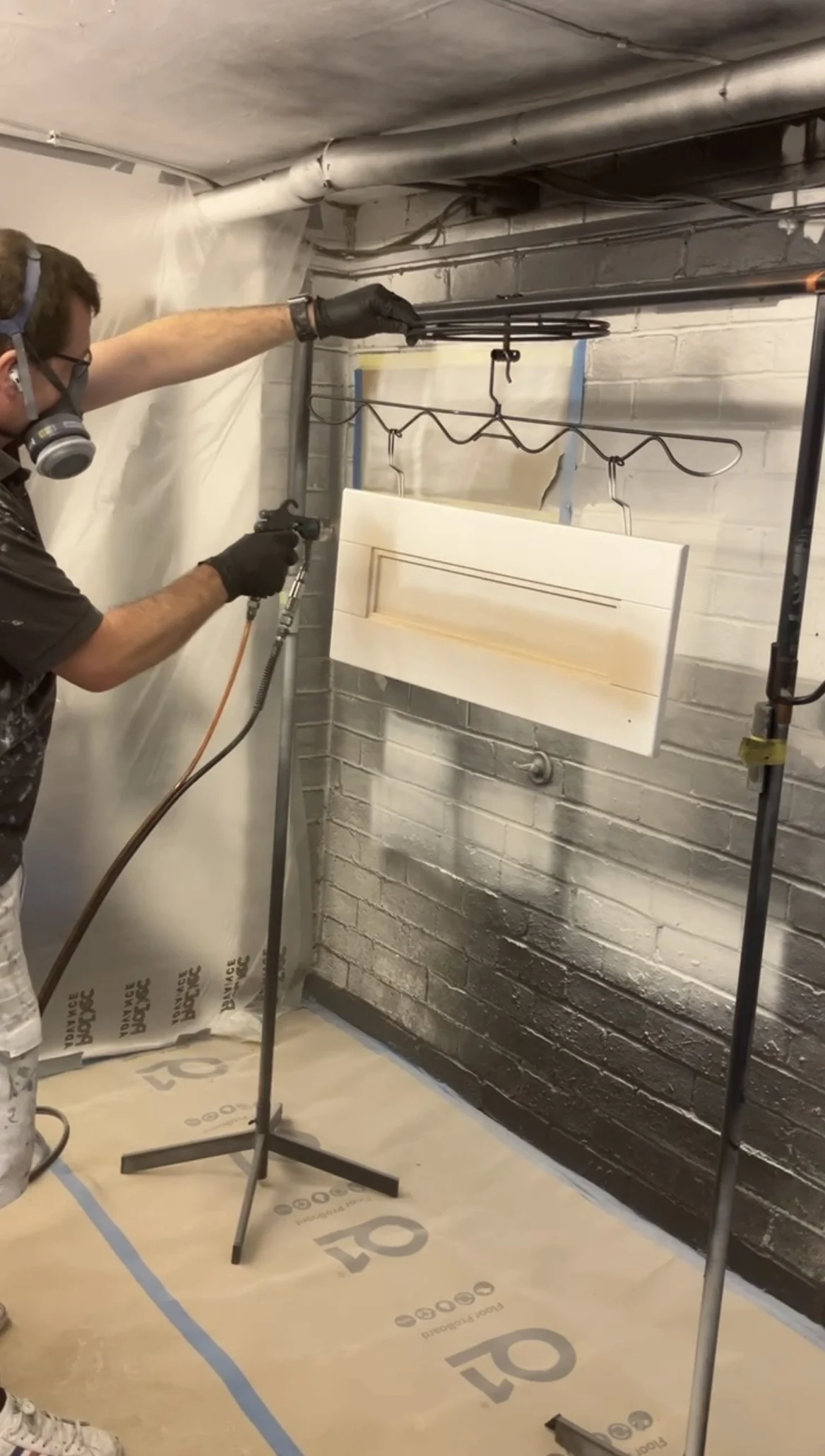 Kitchen door being professionally sprayed off-site