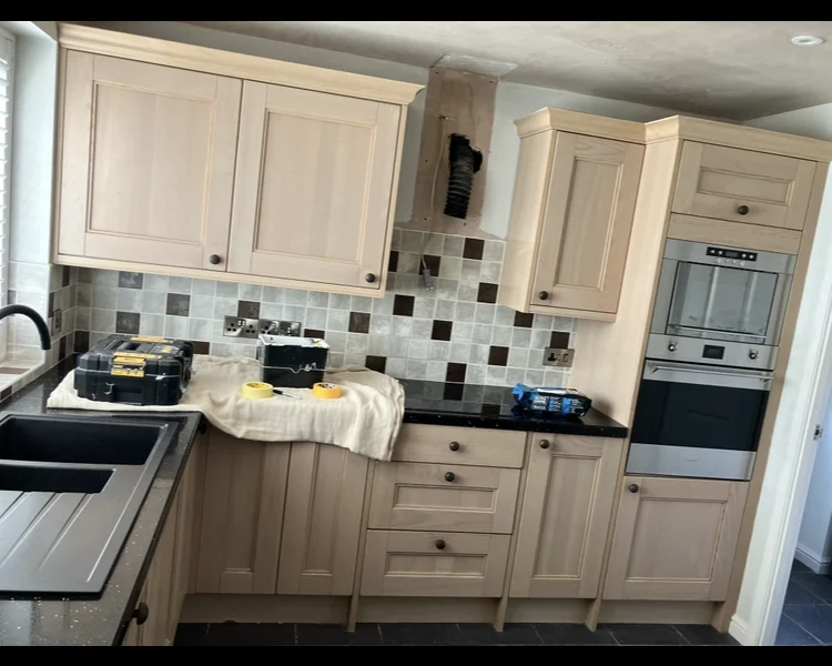 Timber-effect kitchen before respray